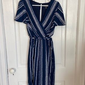 Luxology jumpsuit with flutter sleeves. Size medium.